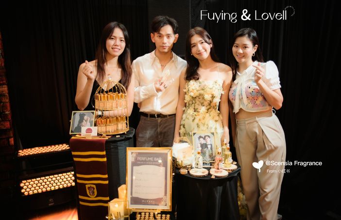 Artists at a Perfume Bar booth