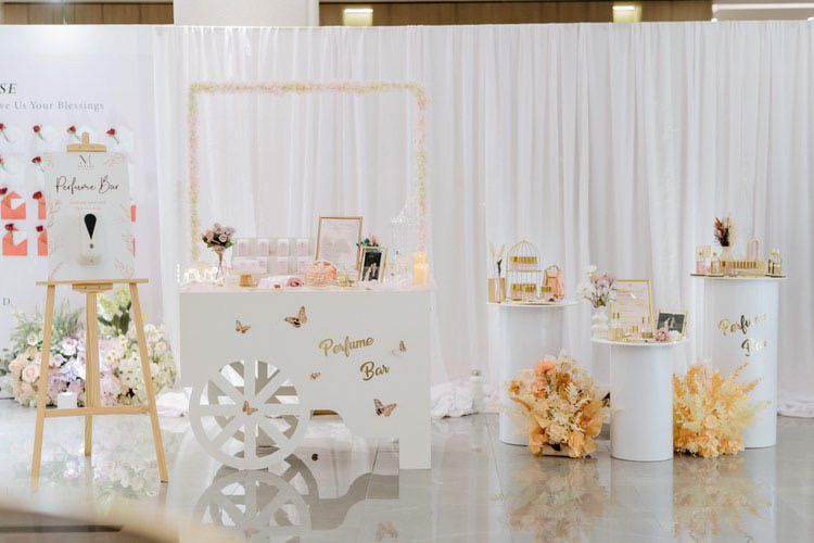 White Perfume Bar cart with butterflies
