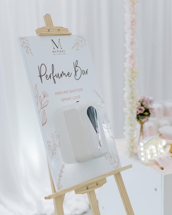 Perfume sanitiser spray station