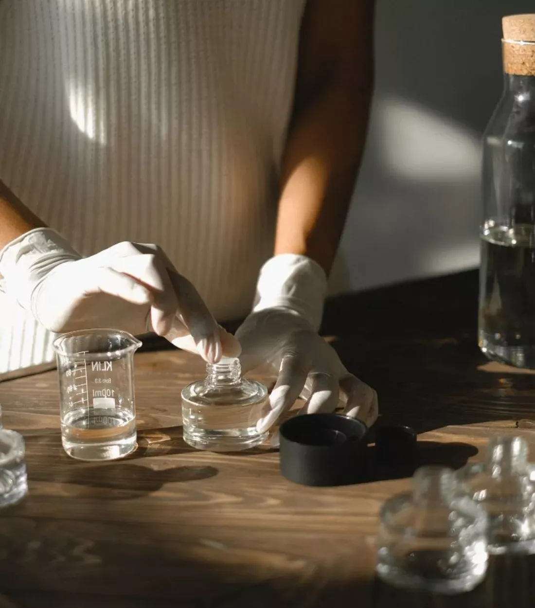 A woman blending her own perfume at a SCENSIA workshop